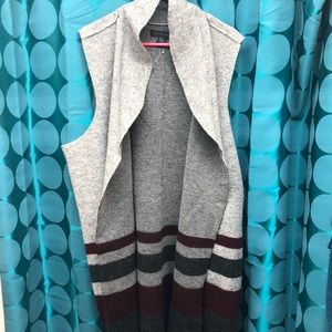 2x sleeveless long cardigan.